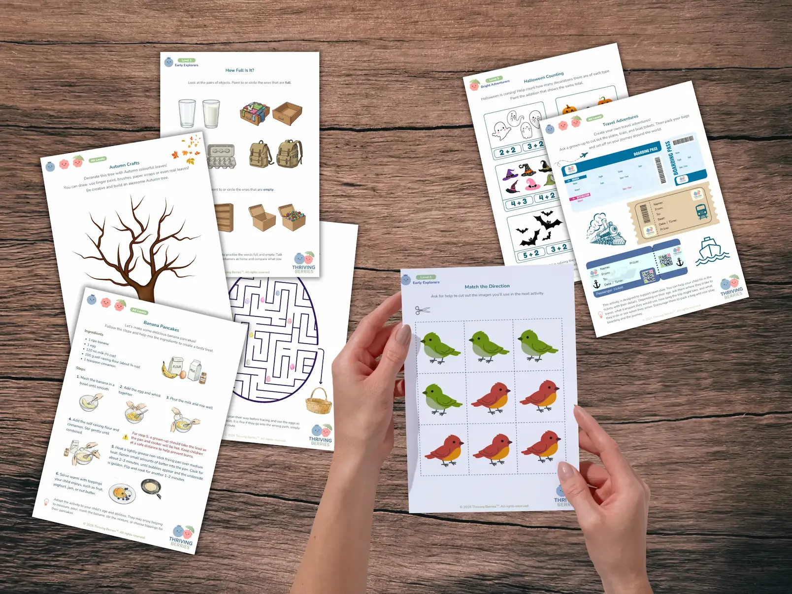 Thriving Berries Monthly Activity Pack on a wooden table