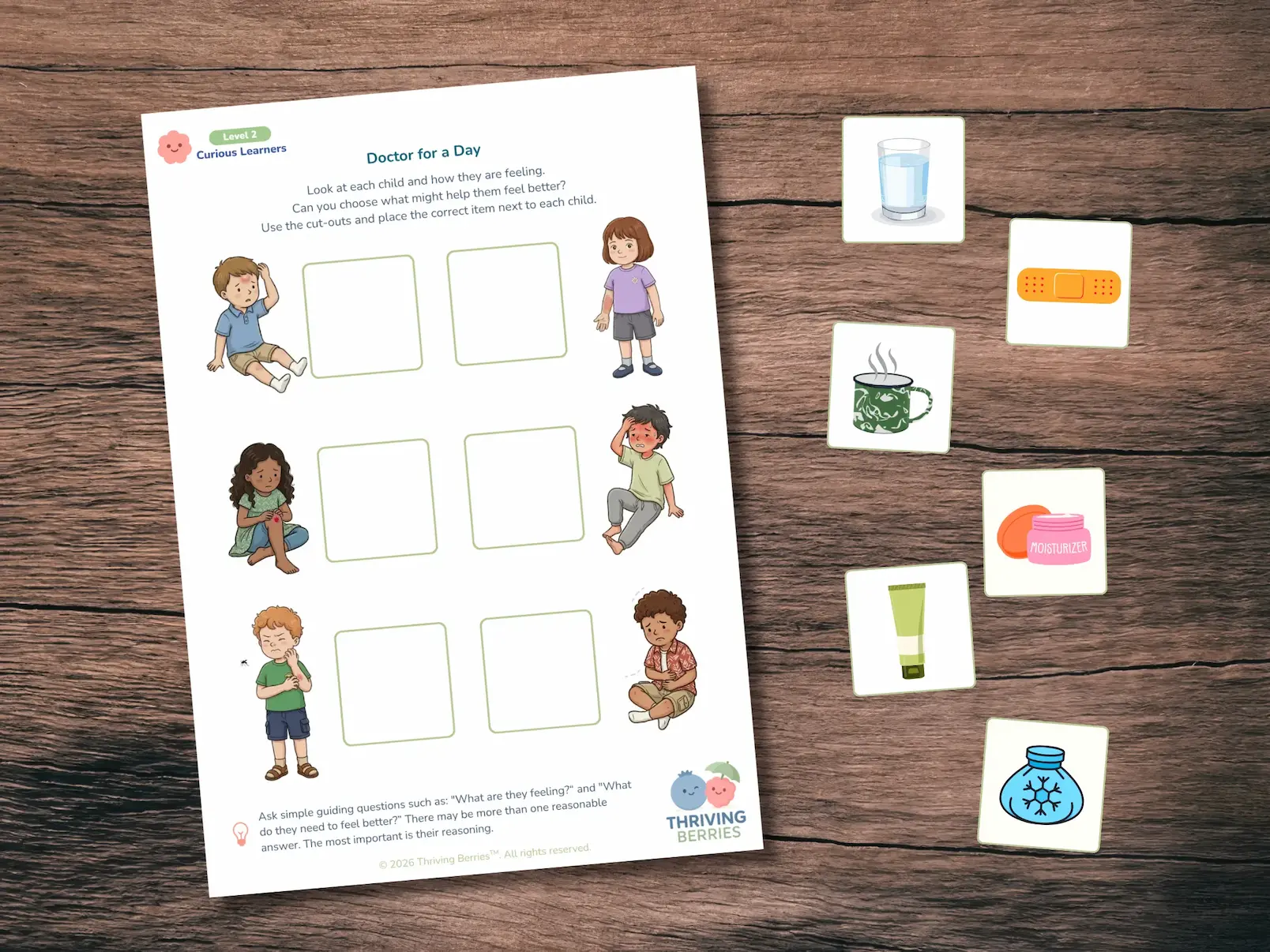 Thriving Berries Monthly Activity Pack on a wooden table